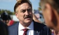 a man, a moustache, speaking