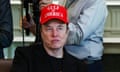 man wearing black shirt and red baseball cap saying 'gulf of america' looks to side